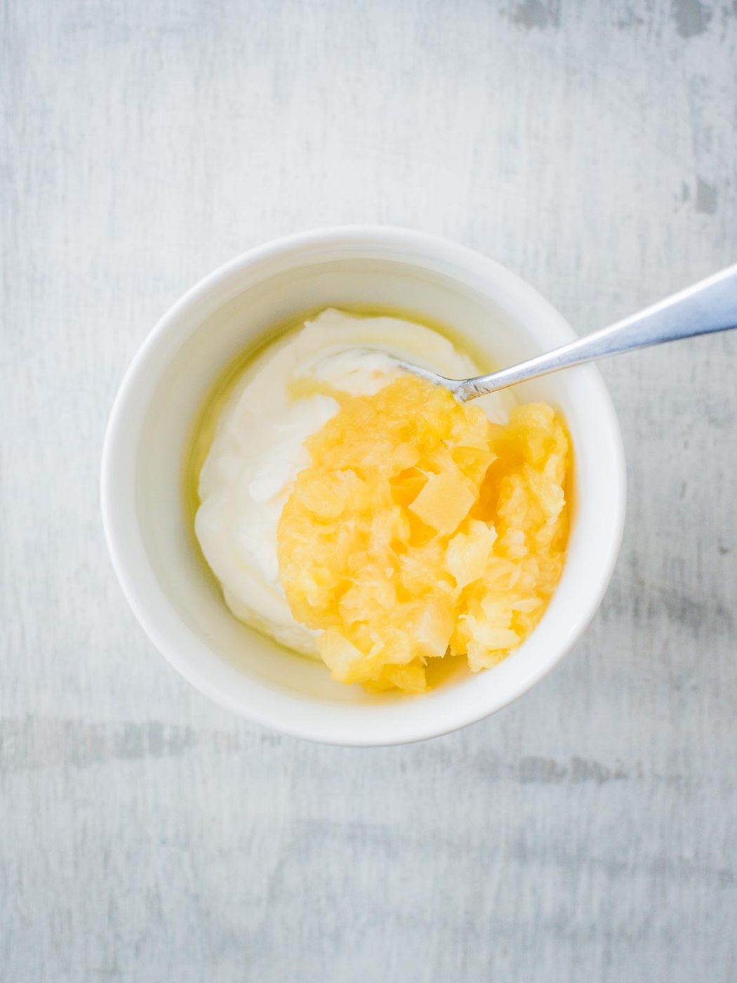 pineapple and yogurt in a bowl