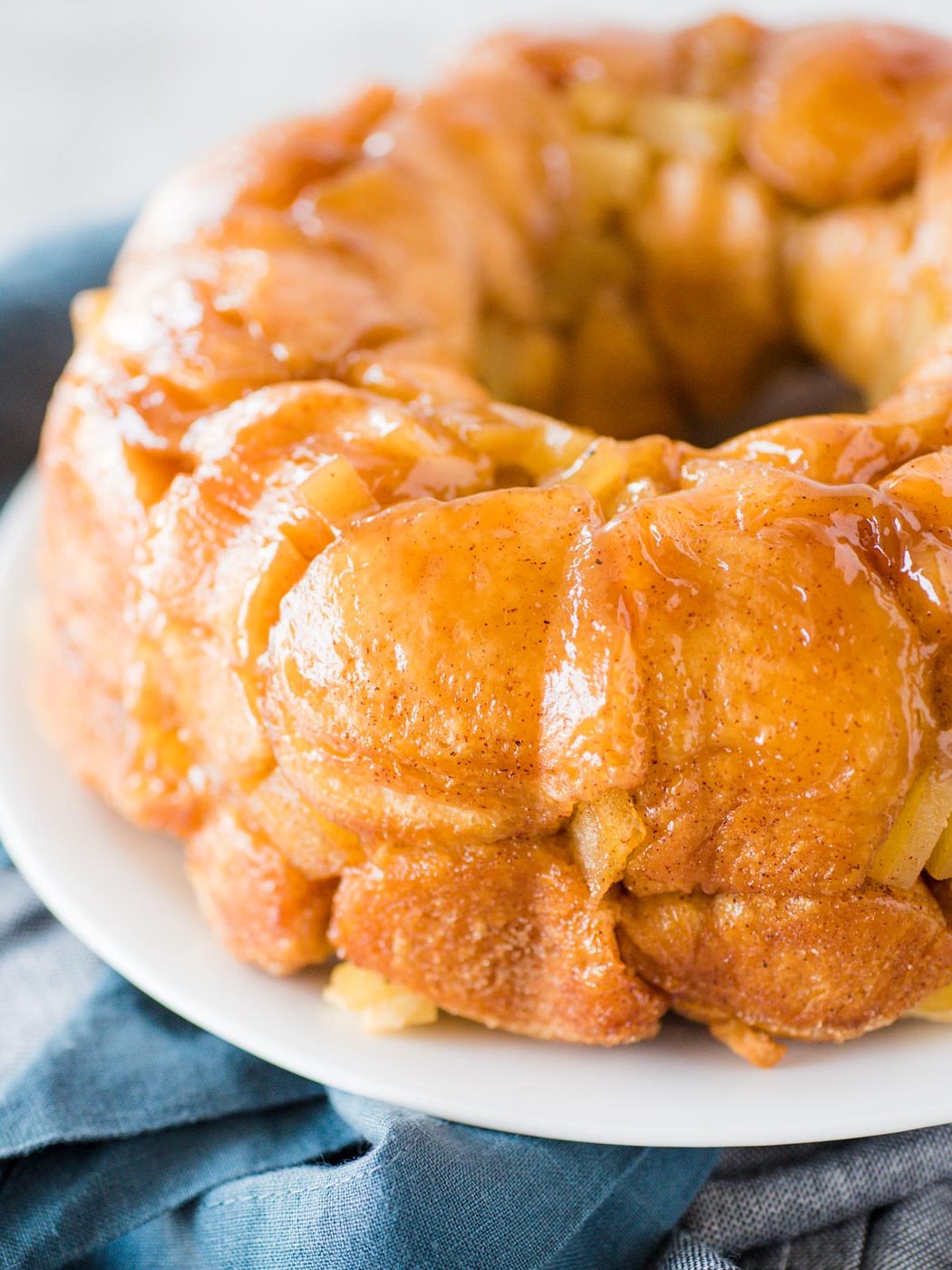 apple cinnamon monkey bread on a white plate