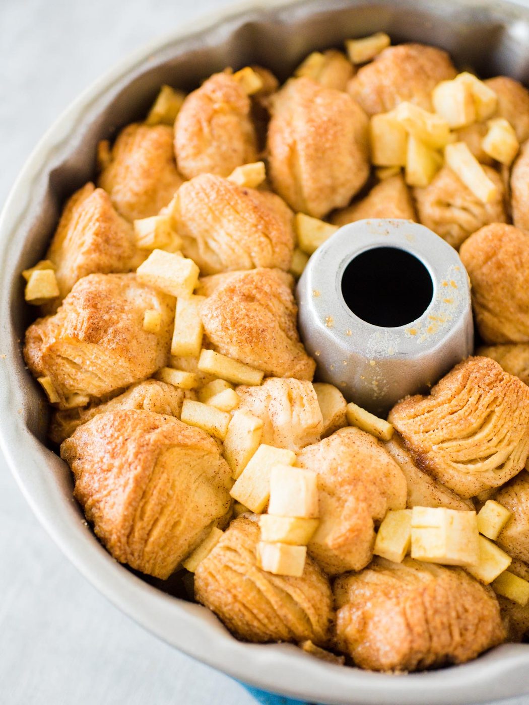cooked apple cinnamon monkey bread in a Bundt pan