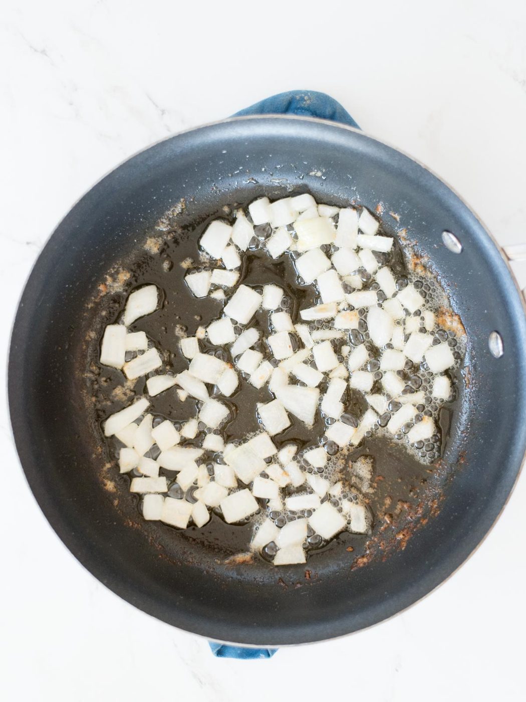 onions sauteed in a skillet