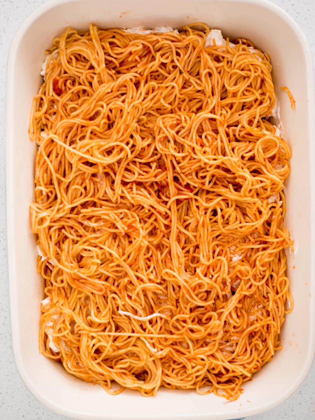 spaghetti mix on top of the cream cheese mixture