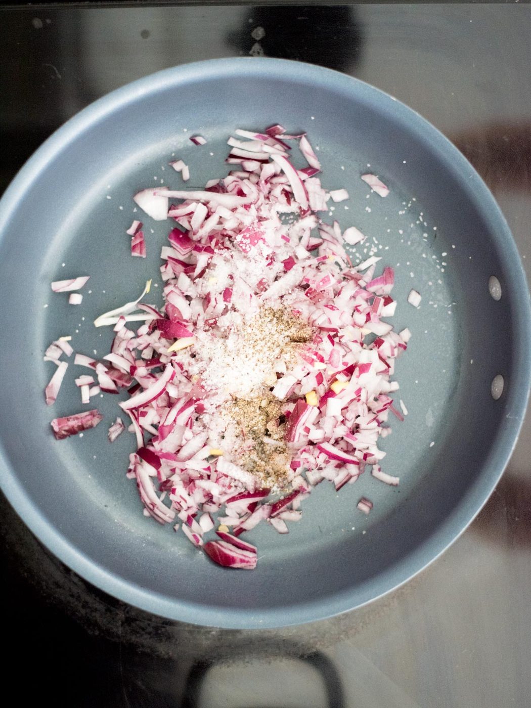 onions and seasoning in a skillet