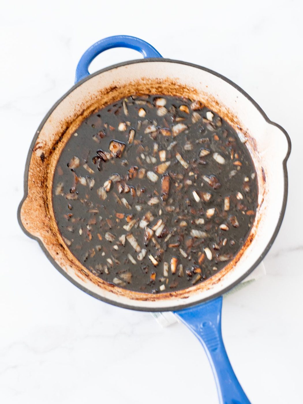 sauce simmering in a skillet
