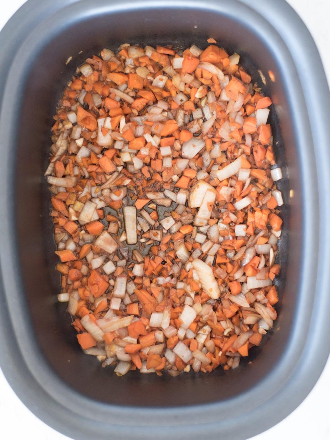 onions, carrots, and garlic combined with red wine