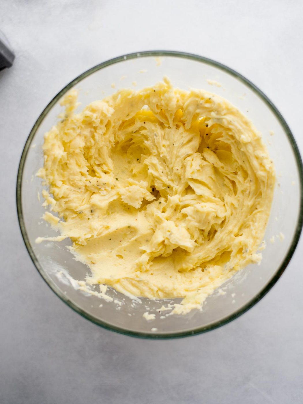 Mixing bowl filled with mashed potatoes.