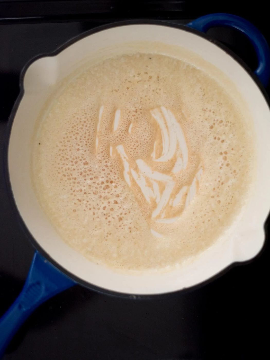 melted butter and flour whisked together in a skillet on the stove