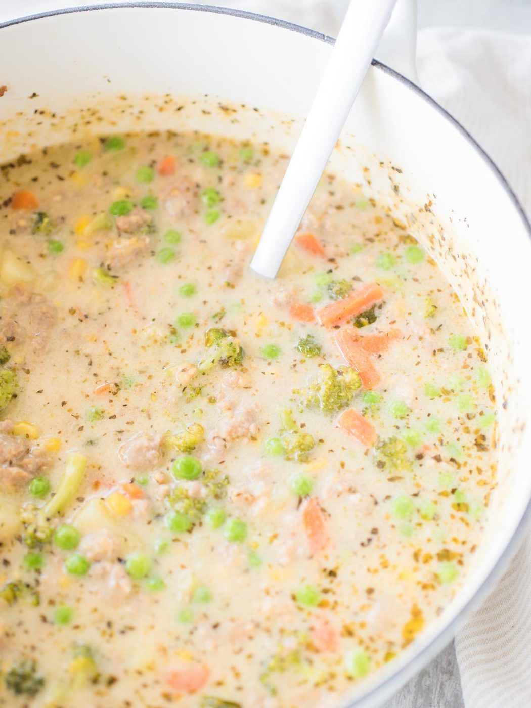 pot of cheesy italian sausage and vegetable soup