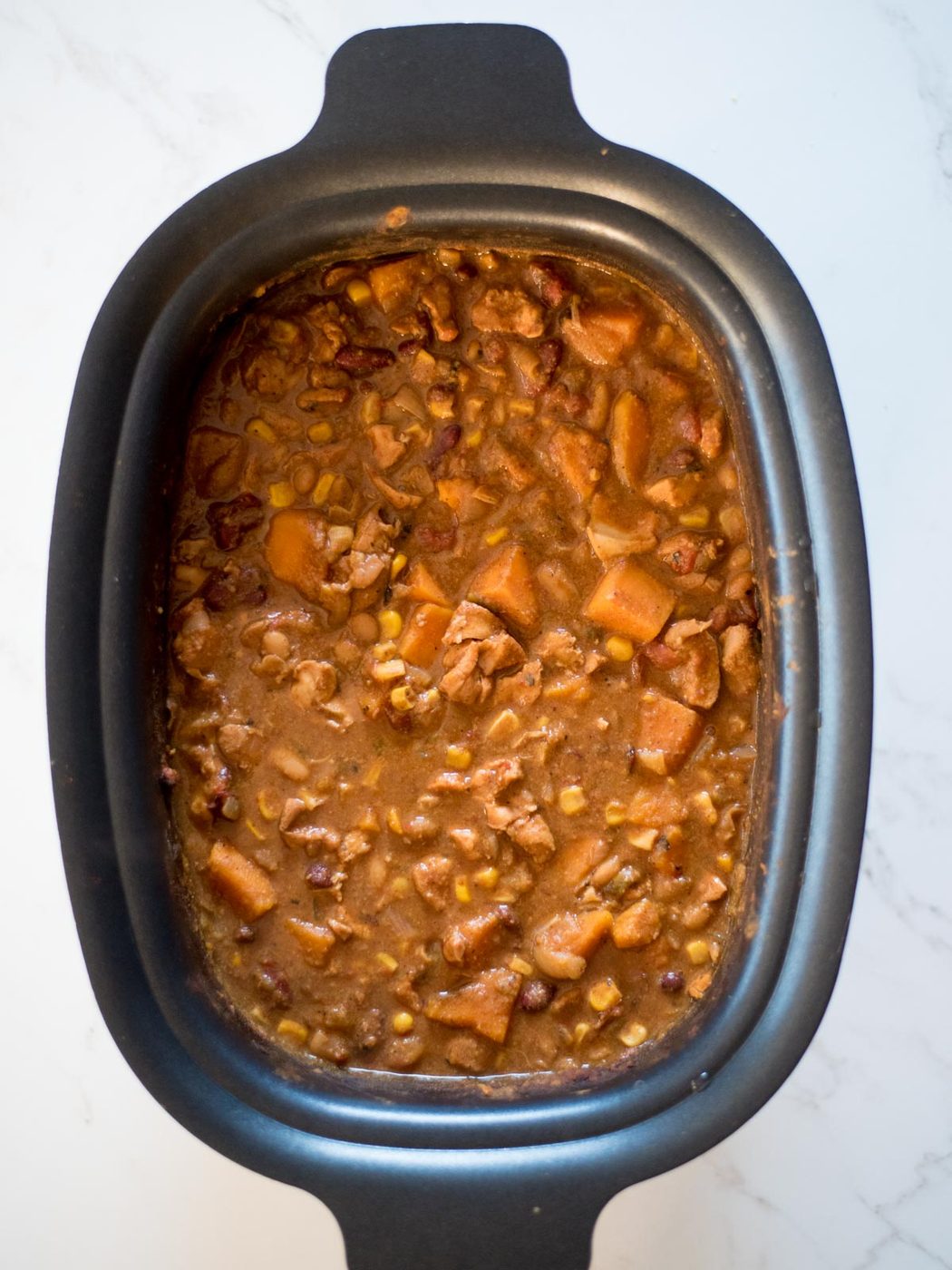 cooked chicken chili in a crockpot before serving