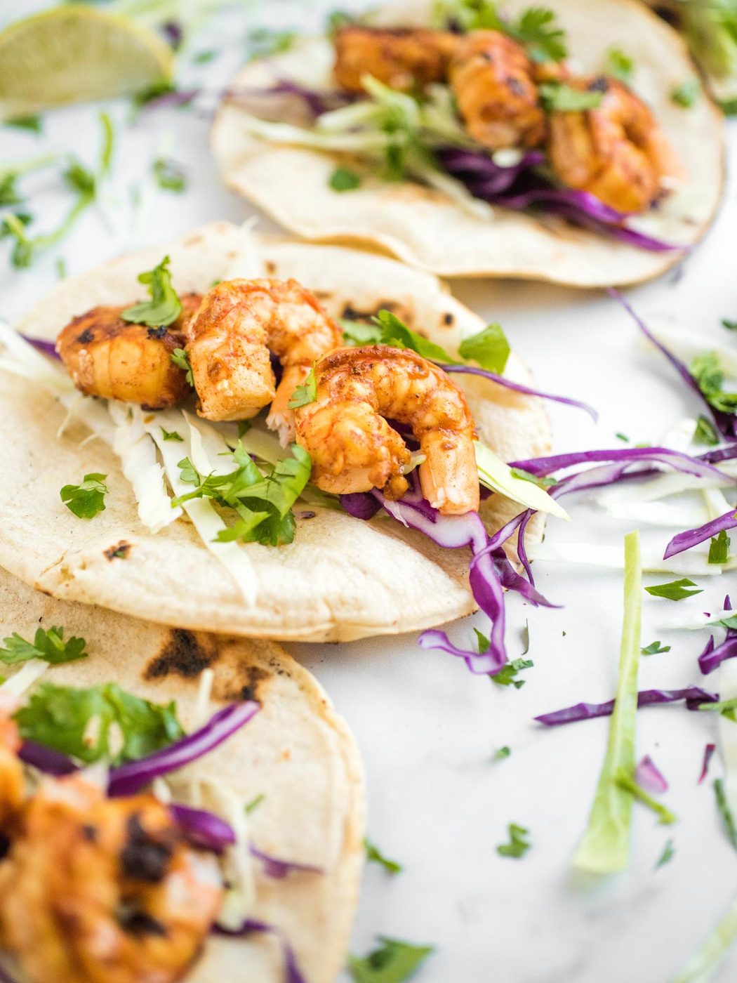 shot of chili lime shrimp tacos opened up