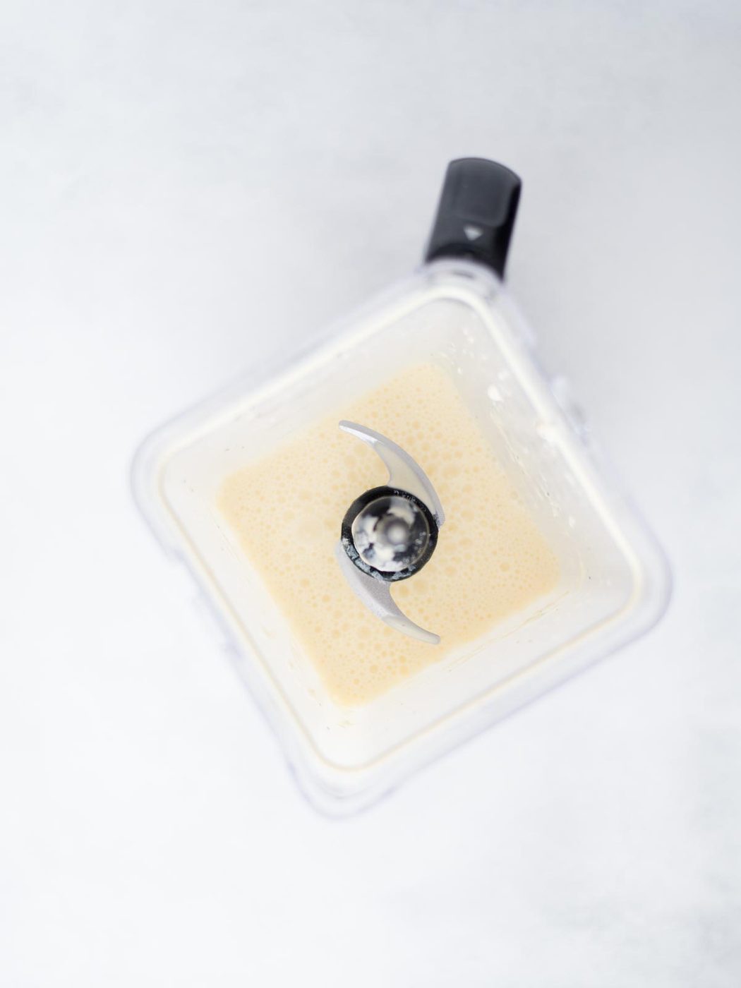 Blender showing the egg mixture combined.