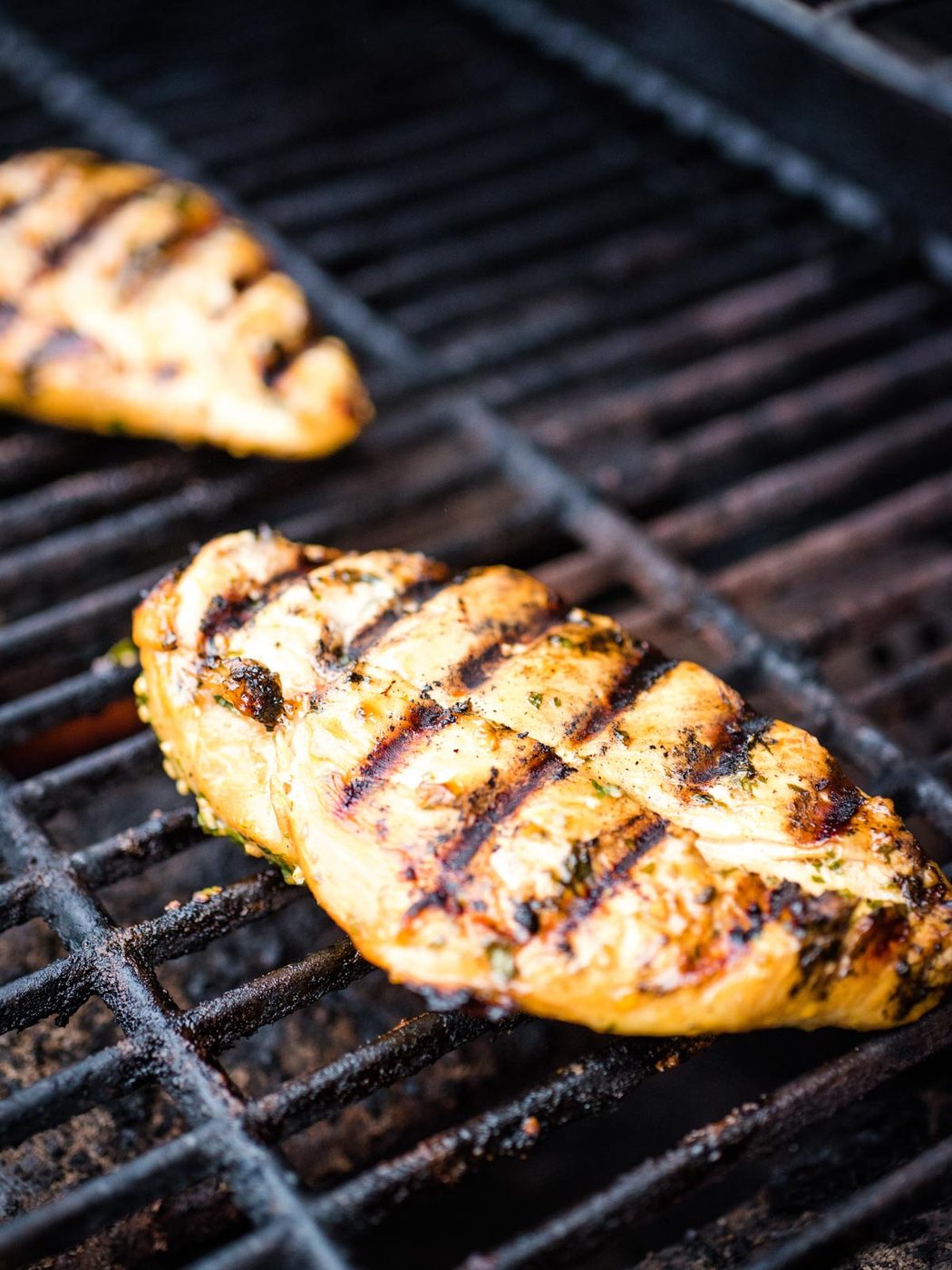 cooked chicken on grill showing grill marks