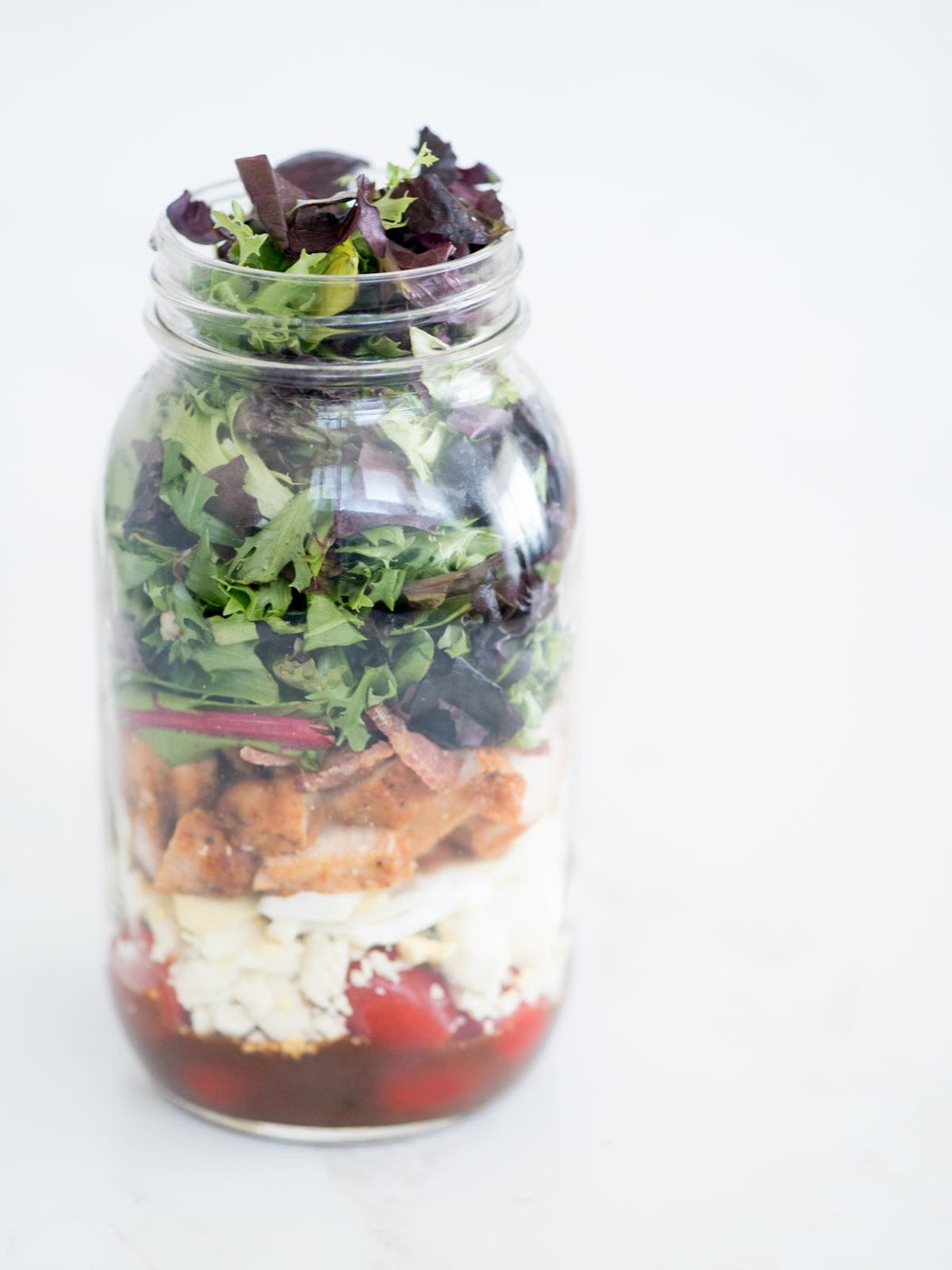 cobb style mason jar salad without the lid on
