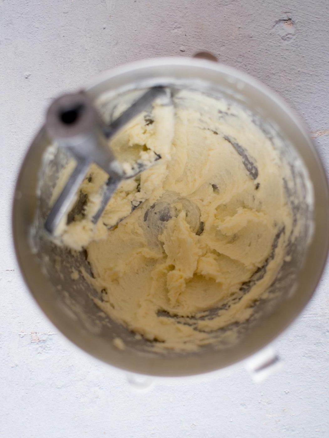 butter and sugar creamed together in a mixing bowl