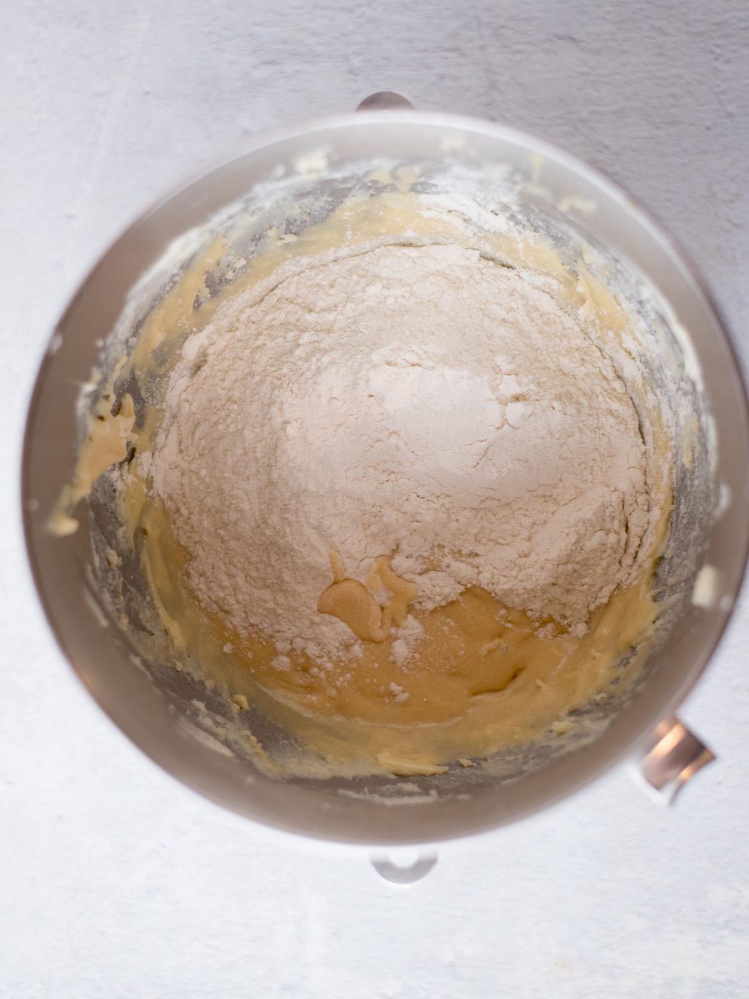 flour added to the dough in a mixing bowl
