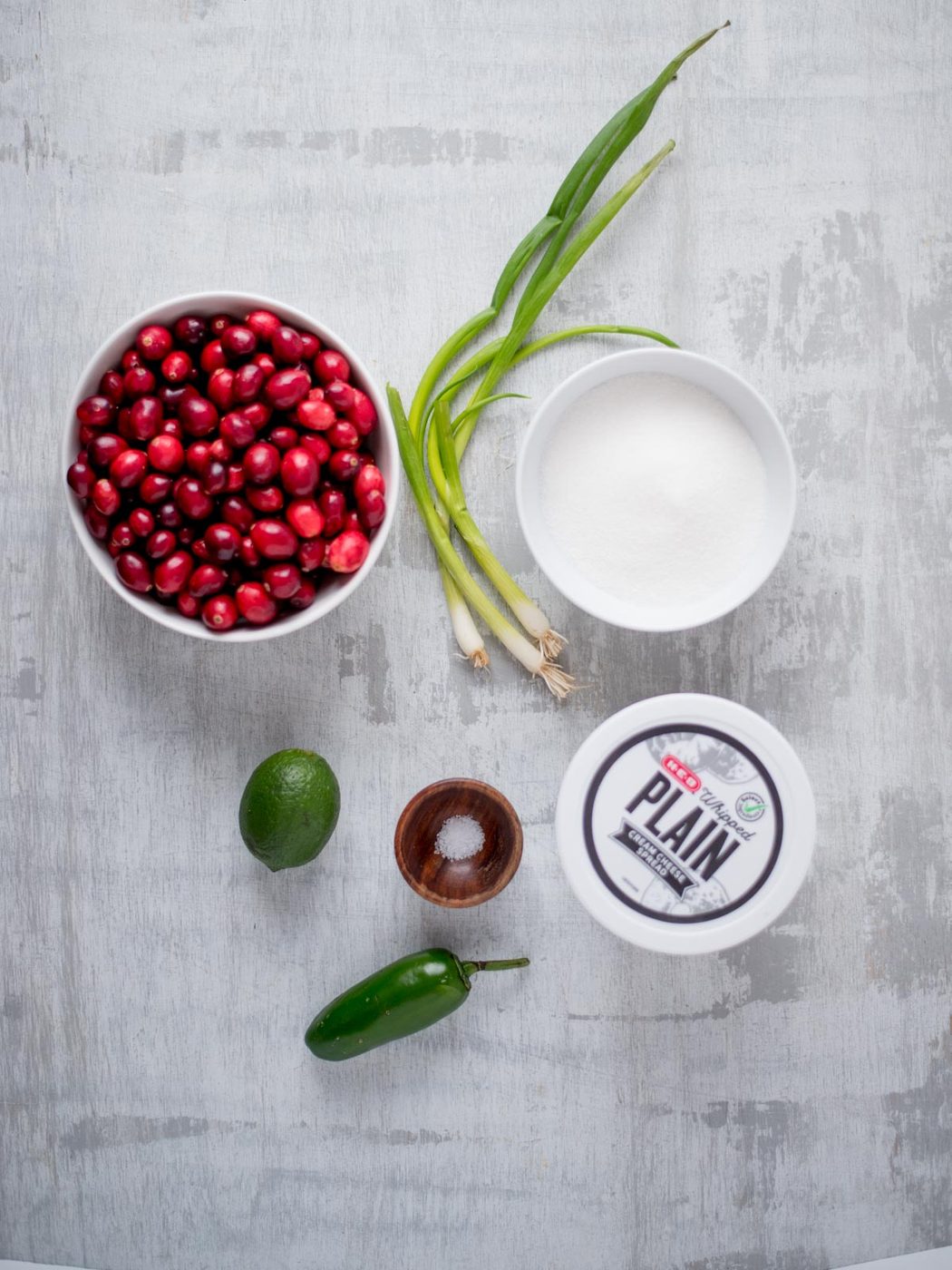 Ingredients needed to make cranberry jalapeno dip.
