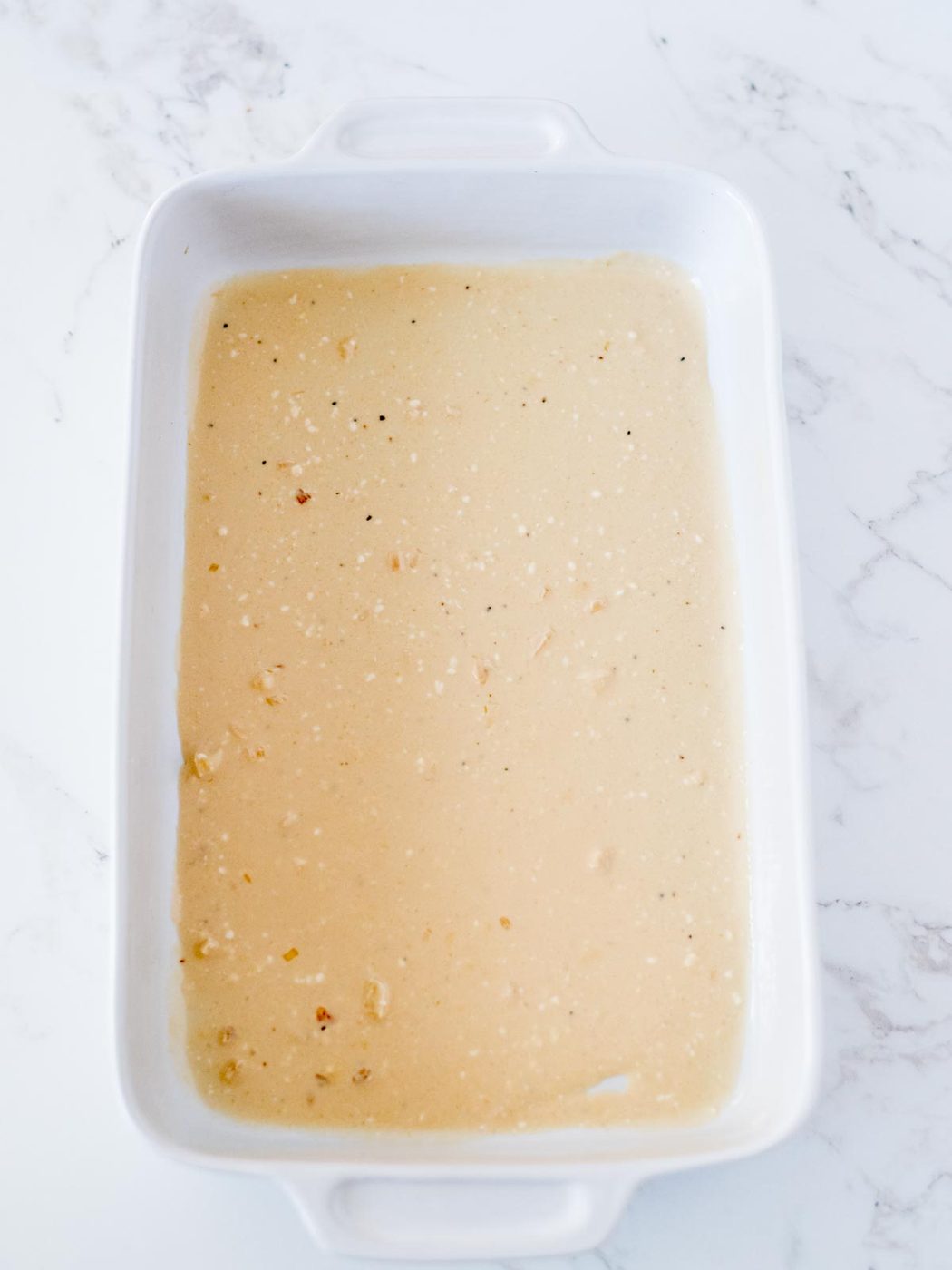 sauce on bottom of casserole dish
