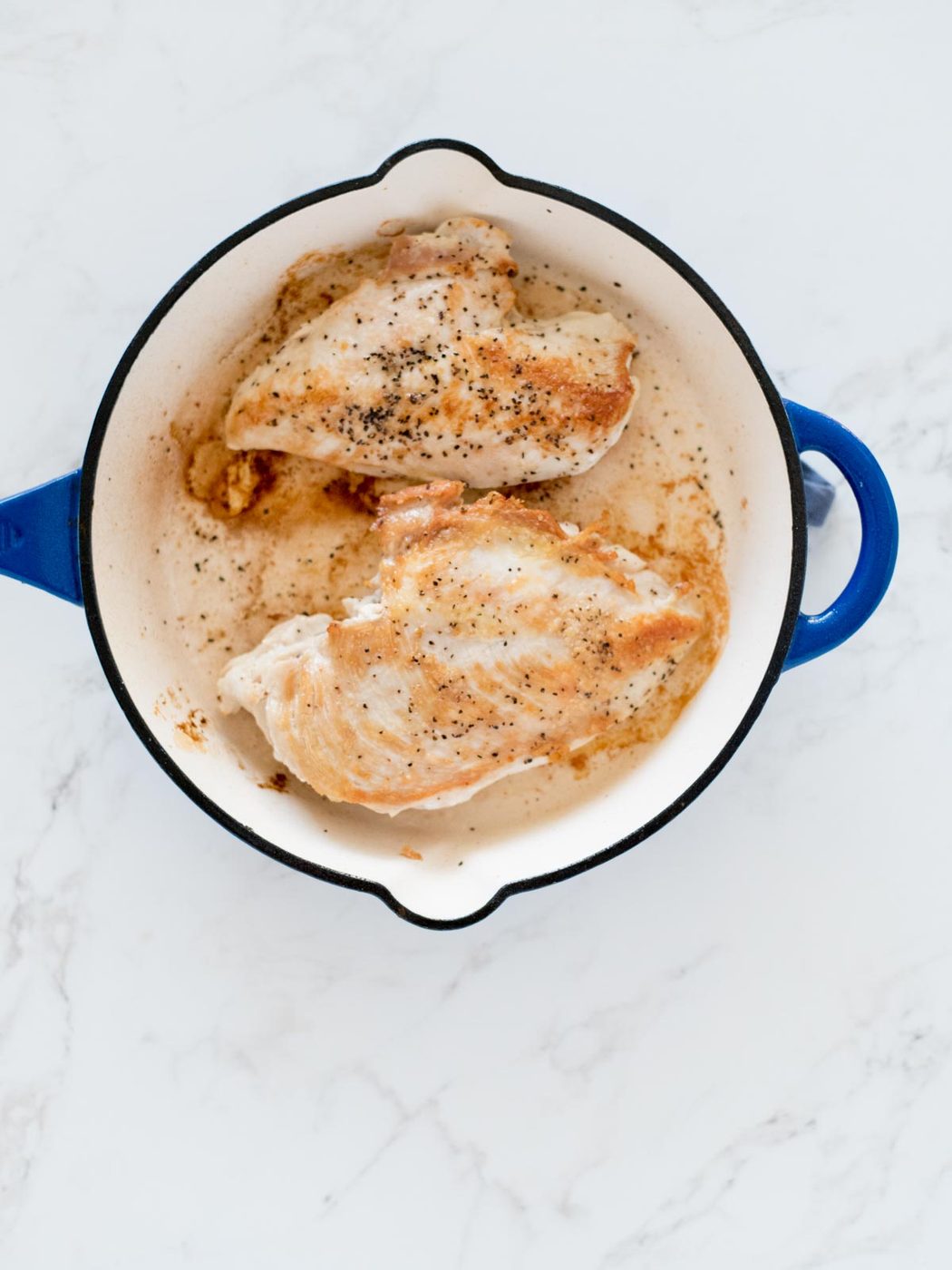 seared chicken in skillet