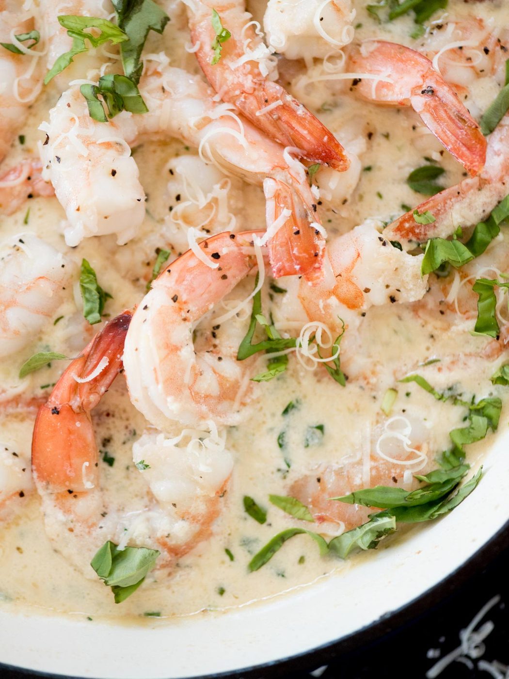 creamy garlic shrimp with parmesan in an enamel cast iron skillet