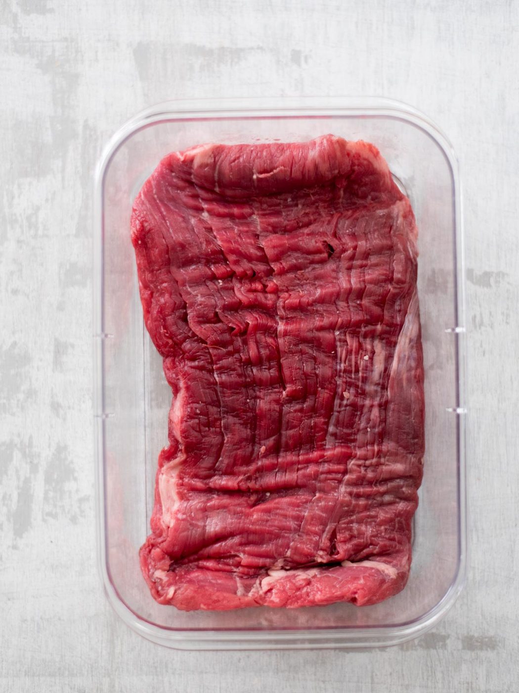 flank steak in container