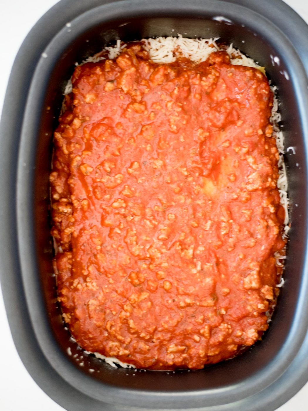 meat sauce over noodles in the crockpot