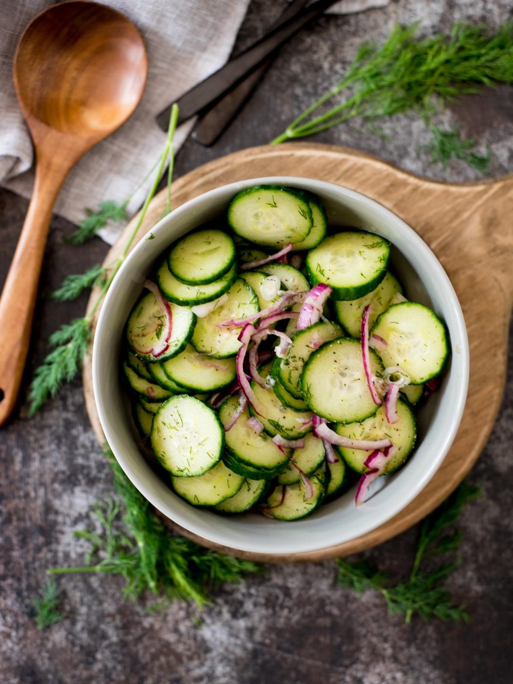 old fashioned cucumbers and onions in vinegar in a bowl