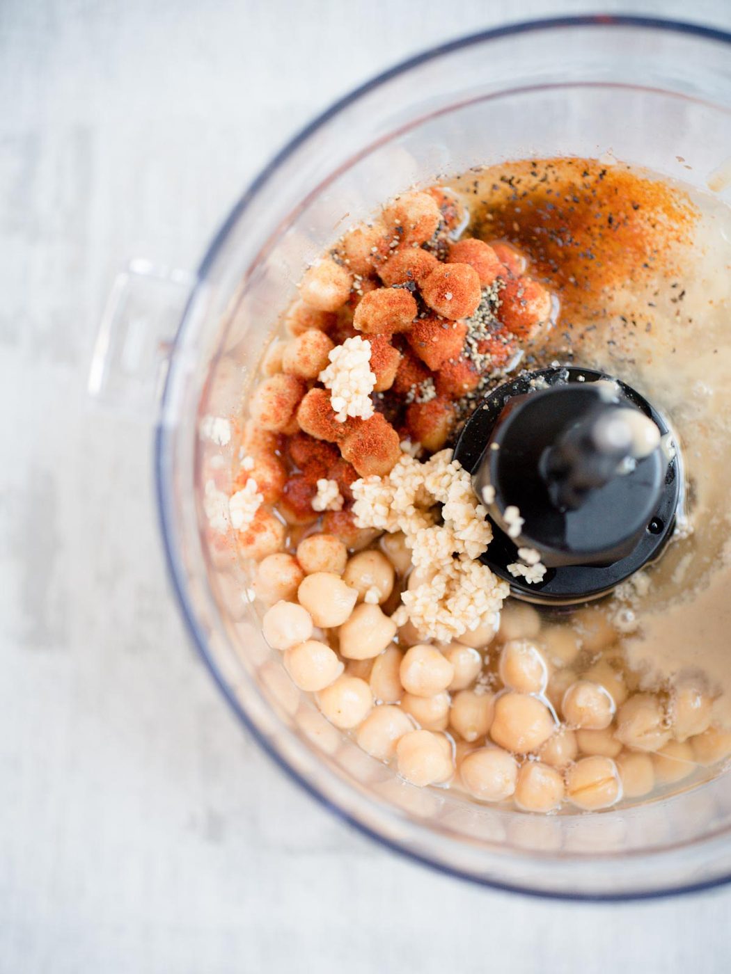 ingredients for from-scratch hummus in food processor