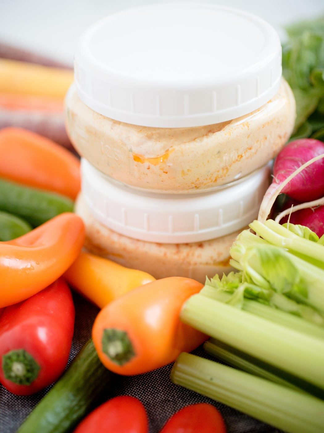 from-scratch hummus stacked in jars