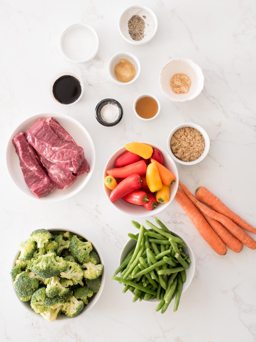 ingredients for straightforward sheet pan beef teriyaki including vegetables, sauce ingredients, and beef