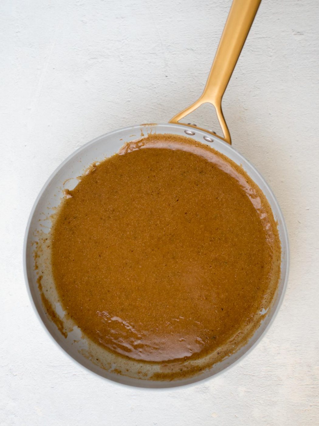 from-scratch enchilada sauce in a skillet