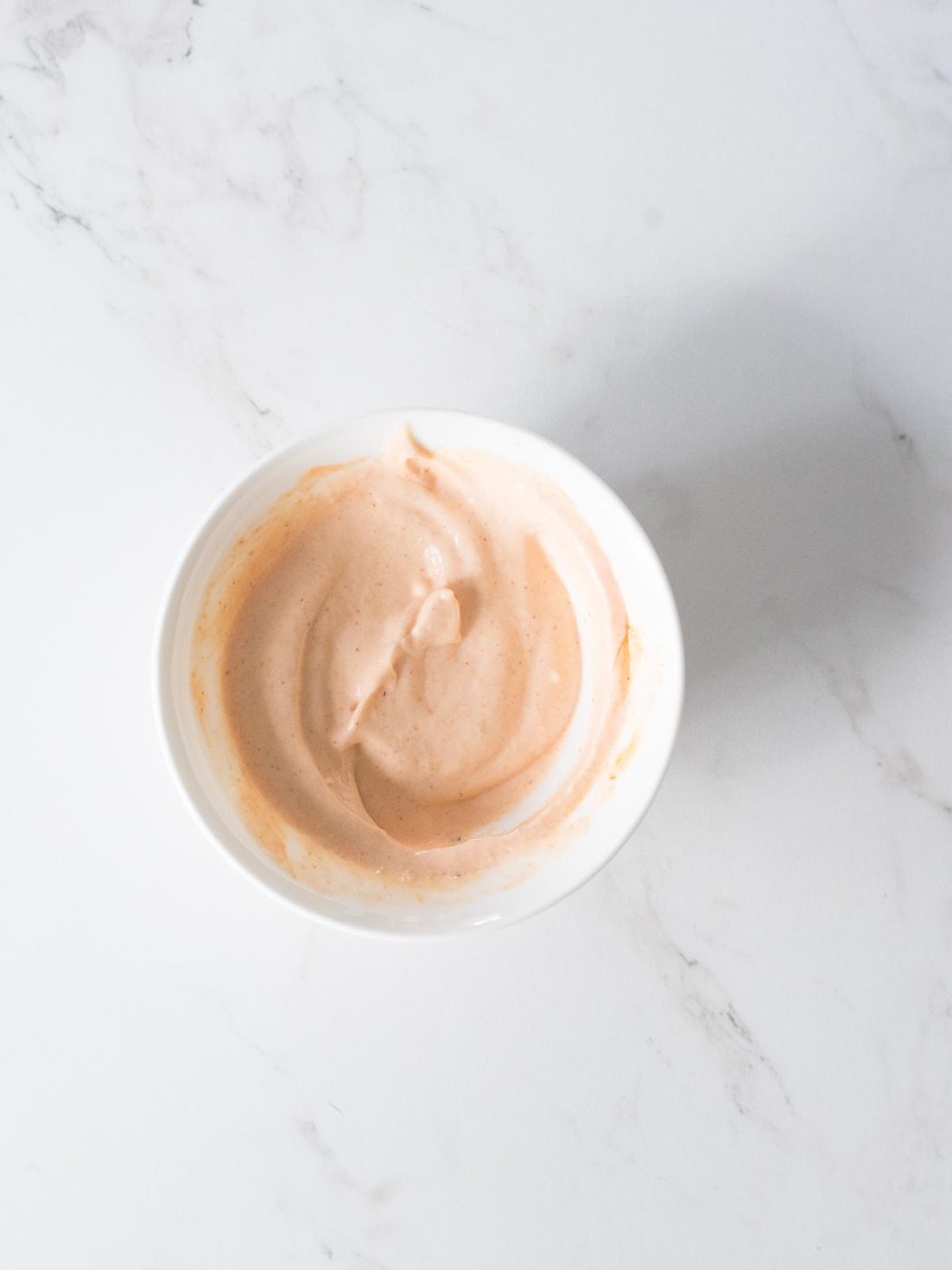 sweet potato fries dipping sauce mixed together in a bowl