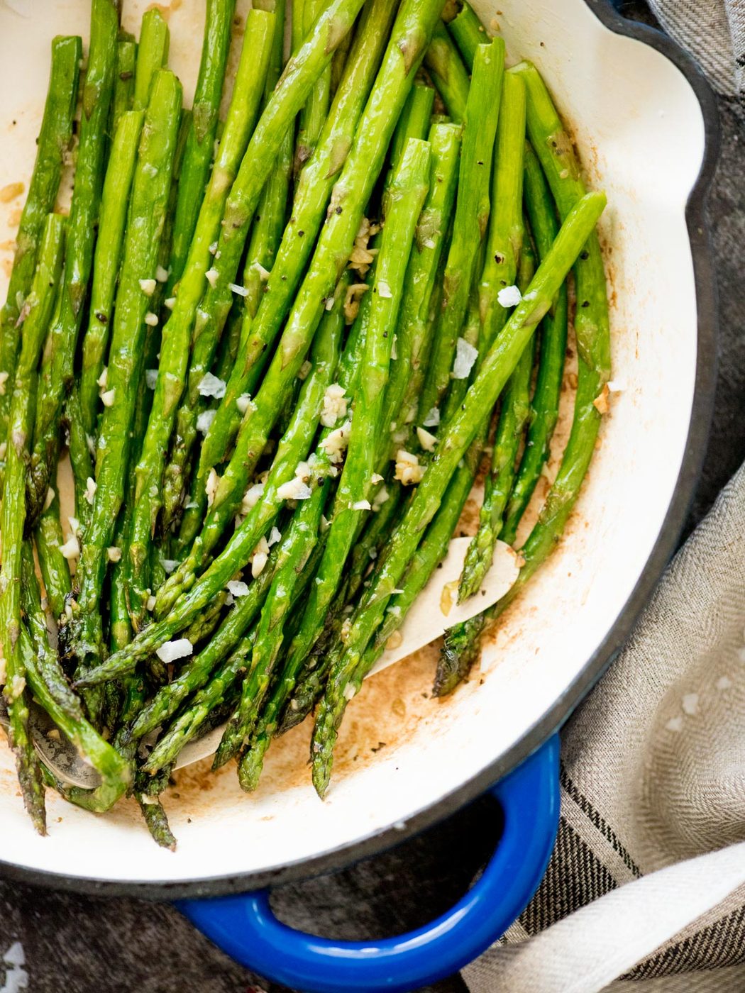 asparagus sauteed in garlic and butter n a cast iron skillet