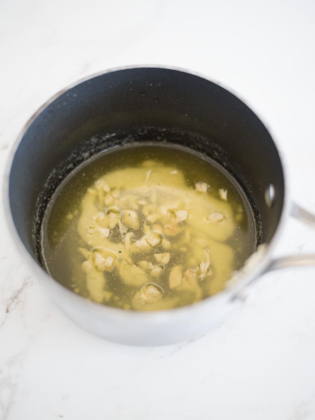 melted butter with garlic in a sauce pan
