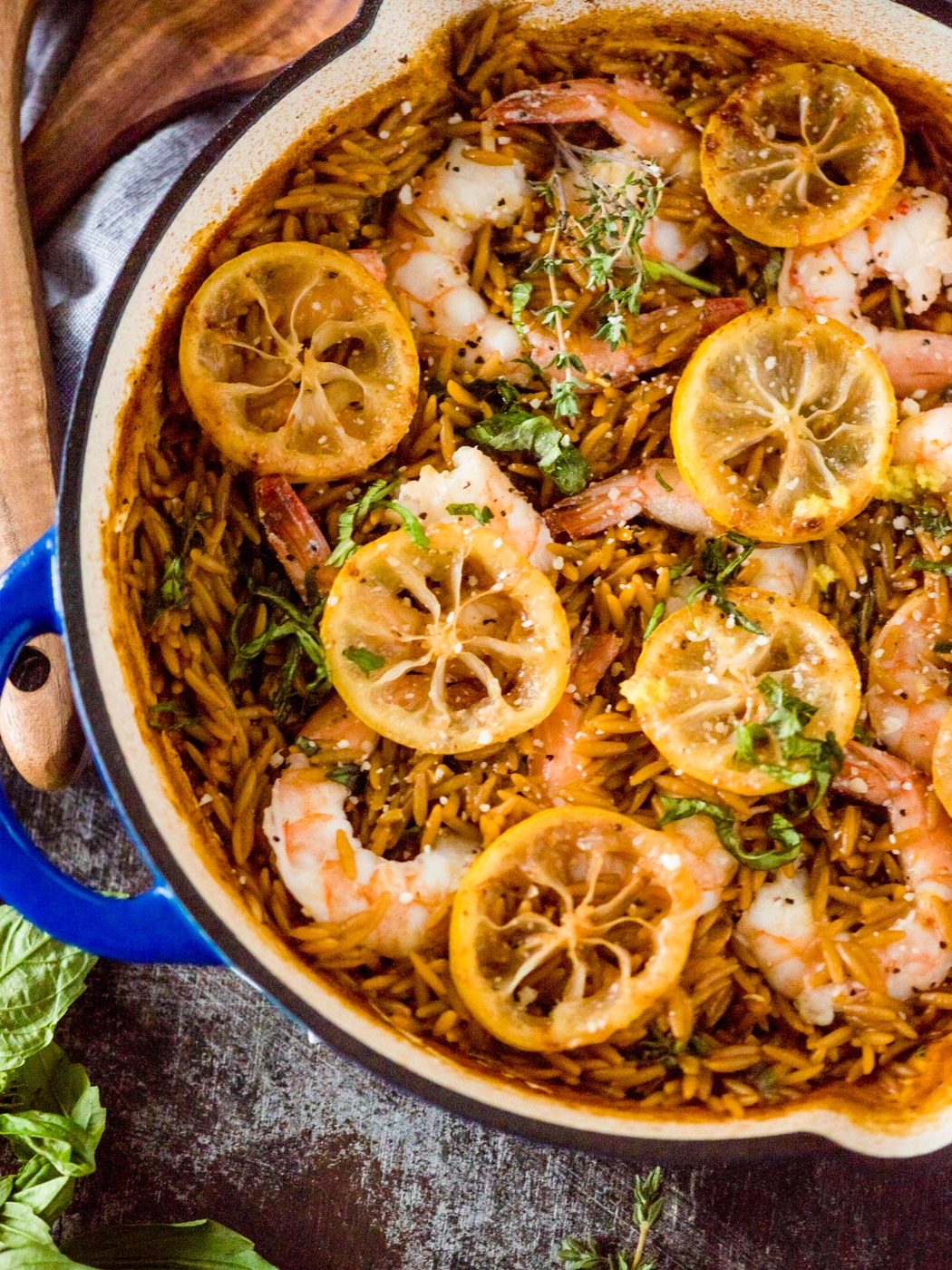 Garlic lemon butter shrimp and orzo in skillet