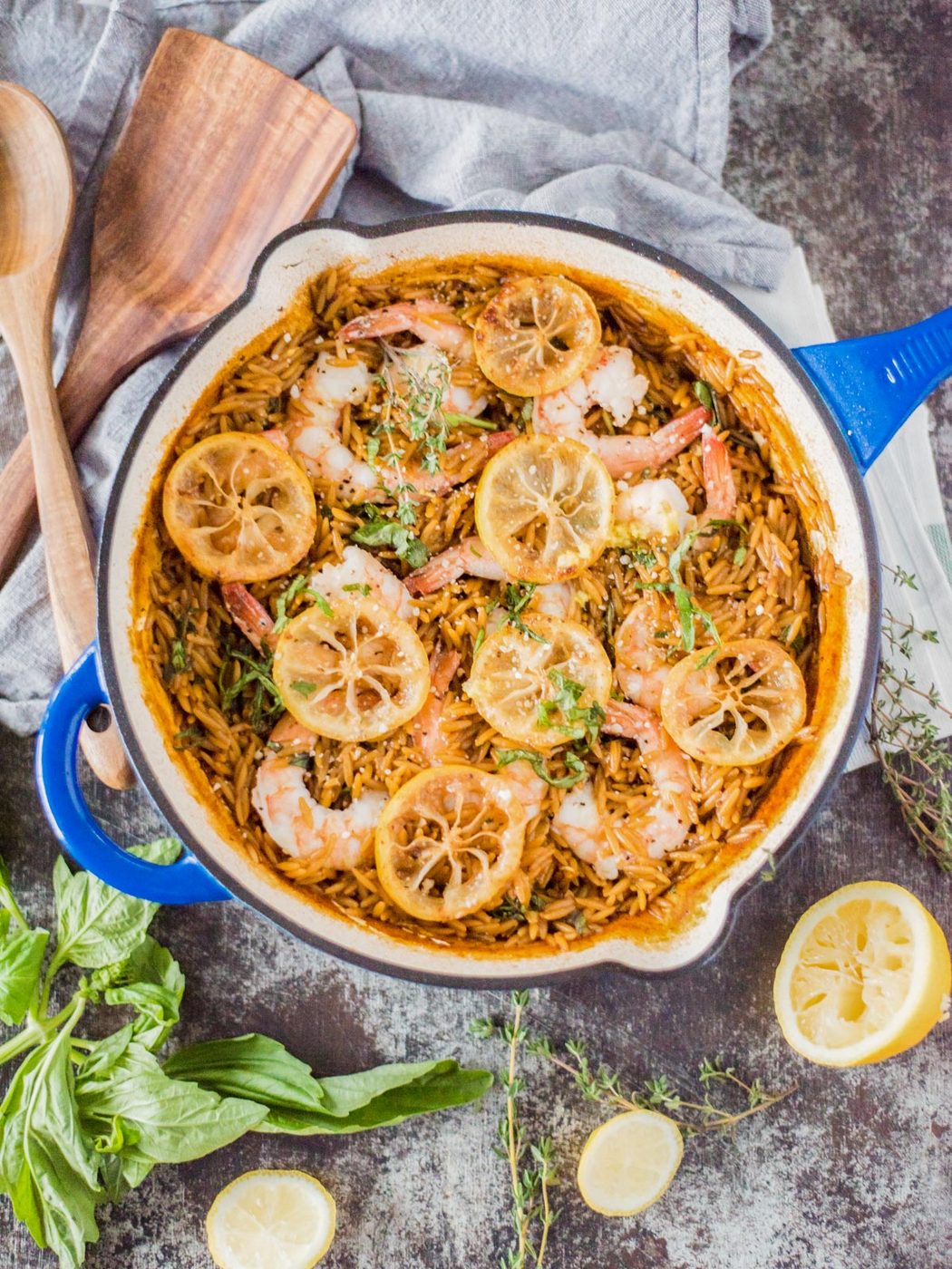 Garlic lemon butter shrimp and orzo in skillet