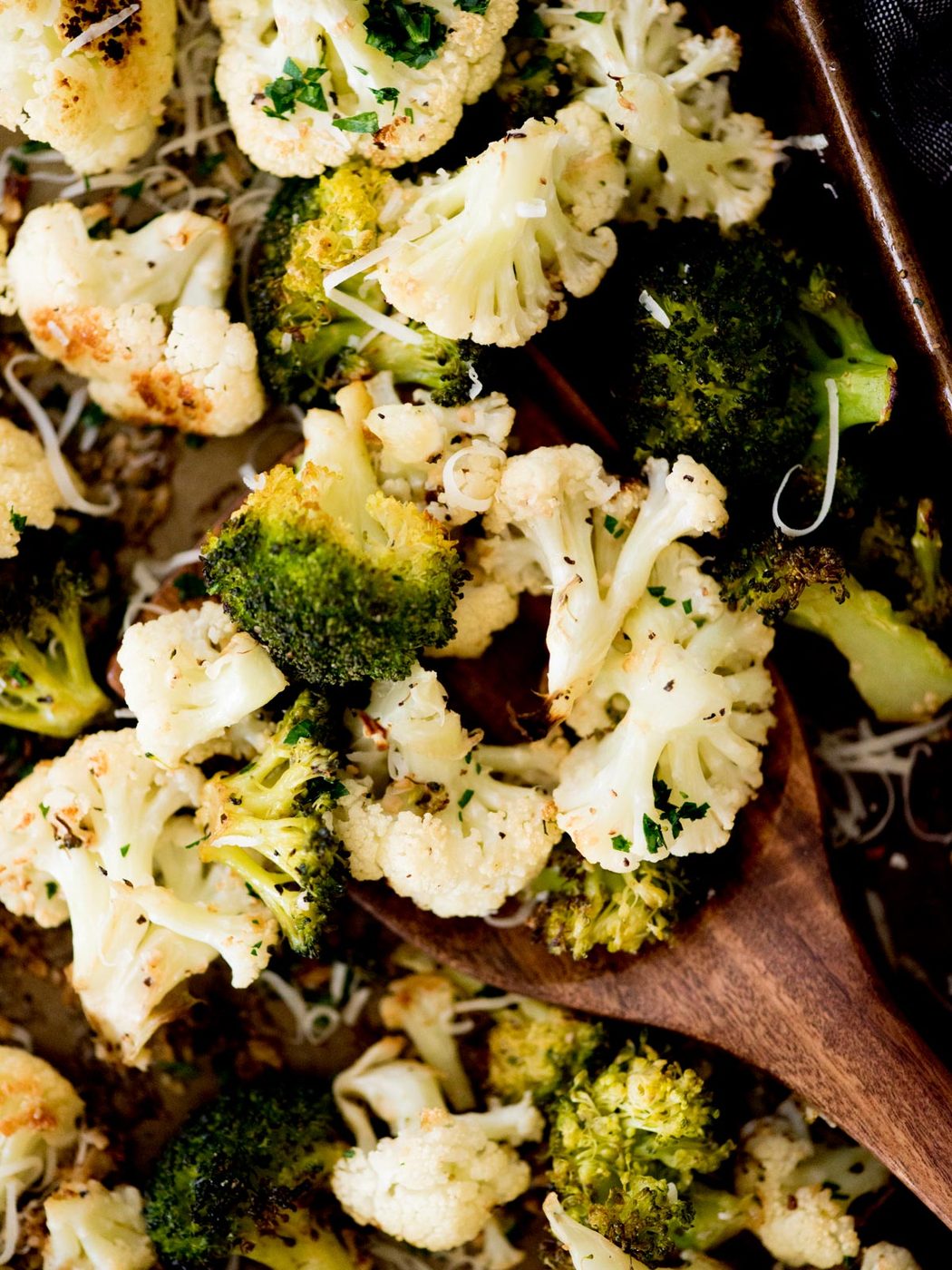 garlic parmesan roasted cauliflower and broccoli on a sheet pan
