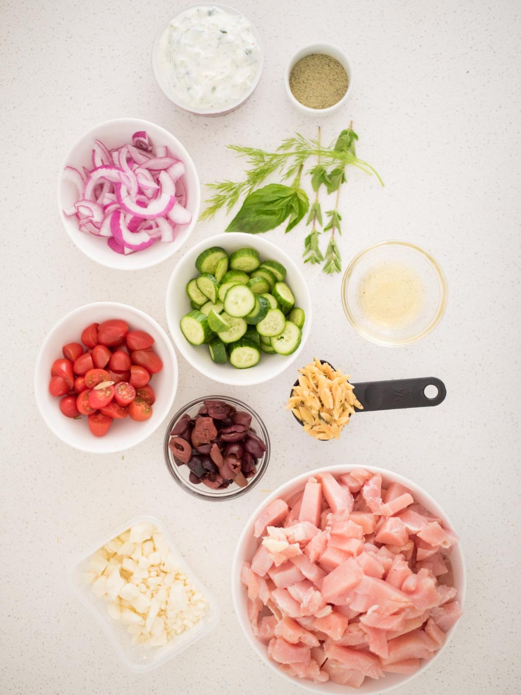 ingredients for a greek chicken bowl