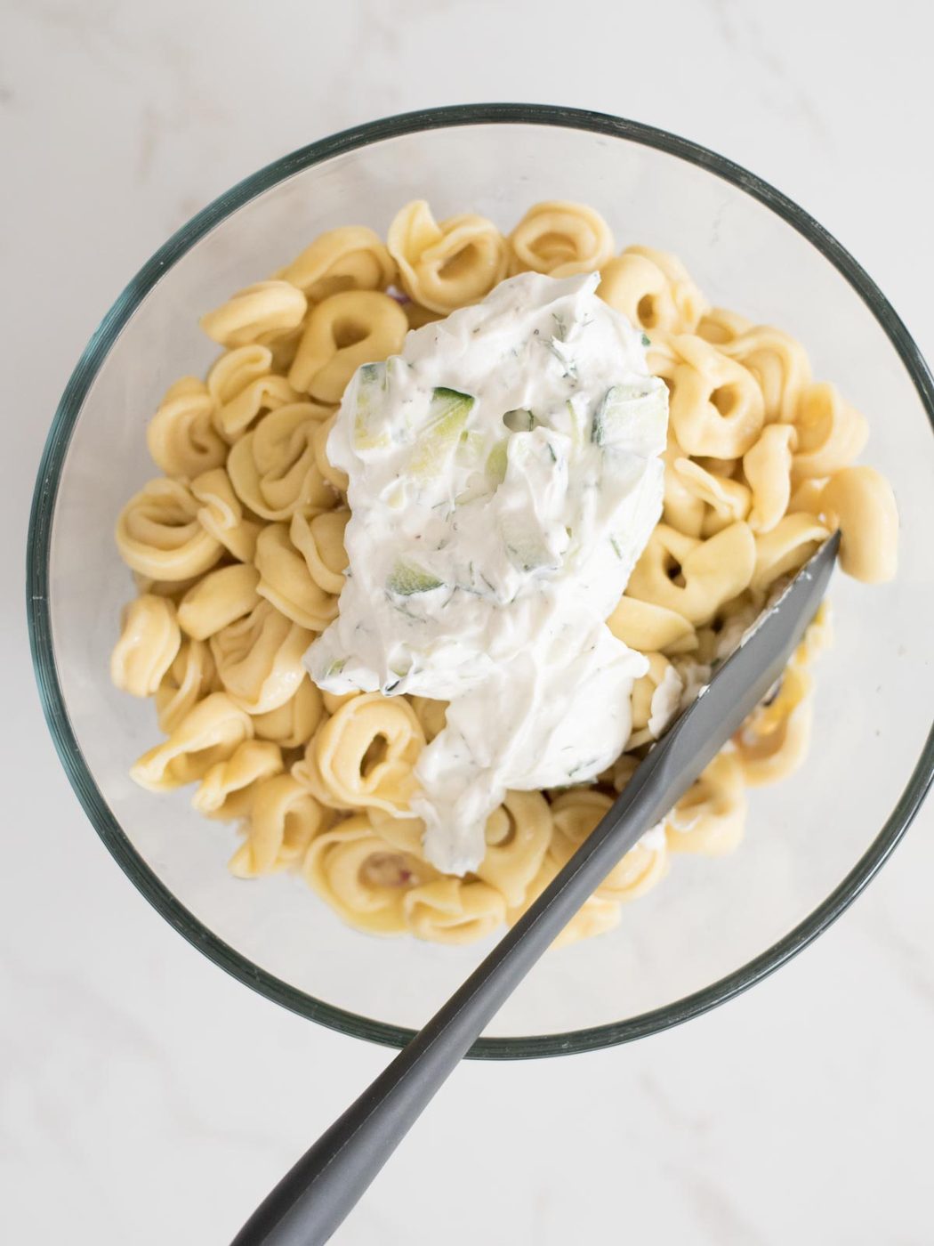 tzatziki added to tortellini