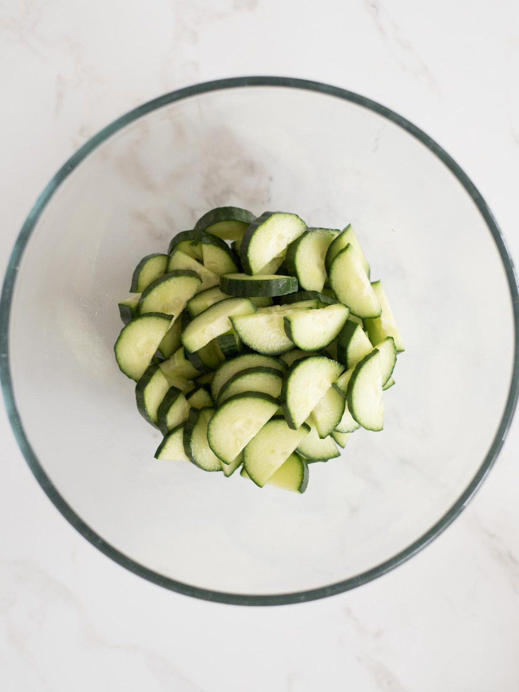 cucumbers added to mixing bowl