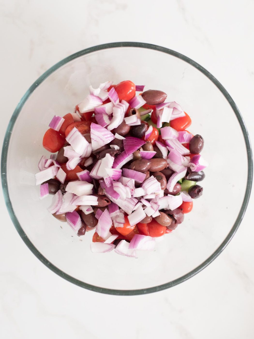 red onion added to mixing bowl