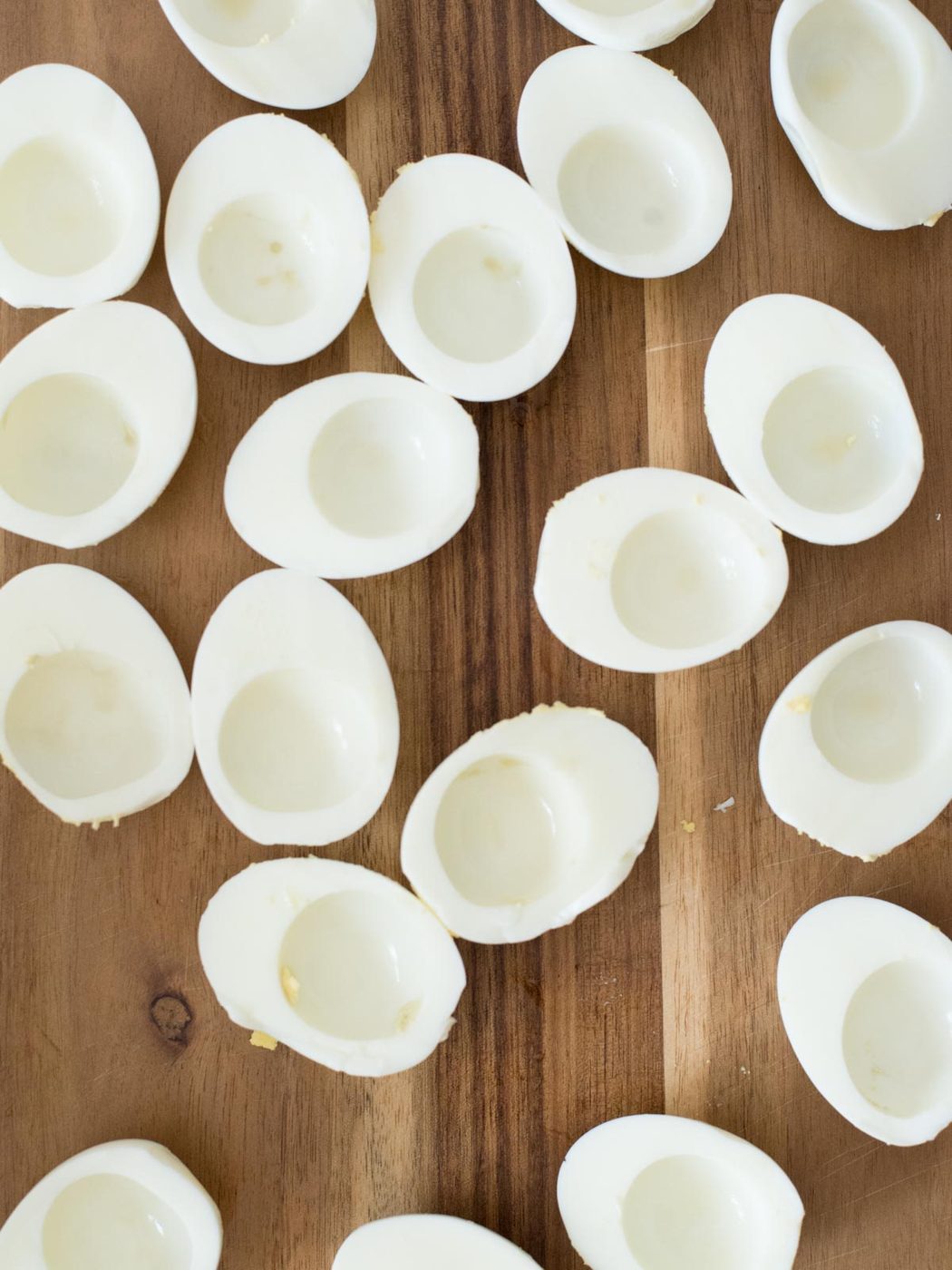 hard boiled egg whites on a cutting board