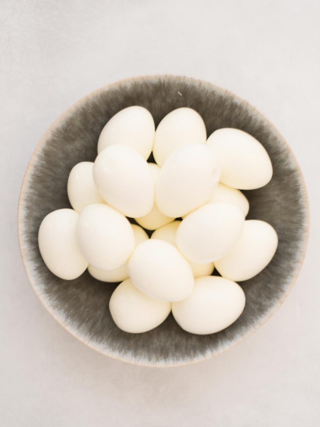 Hard boiled eggs in a bowl.