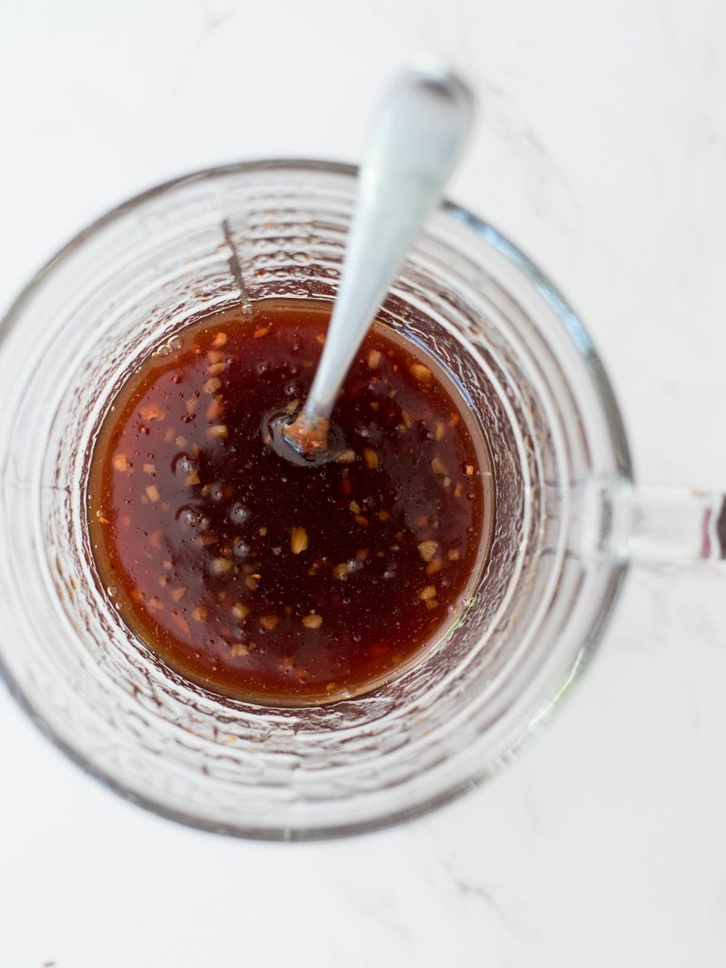 honey garlic sauce mixed together in a measuring glass