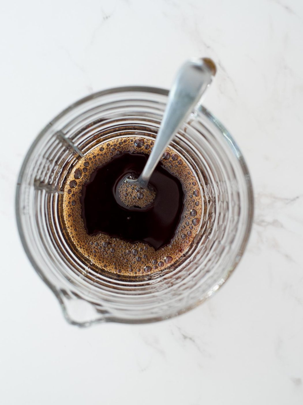 soy sauce added to the measuring glass