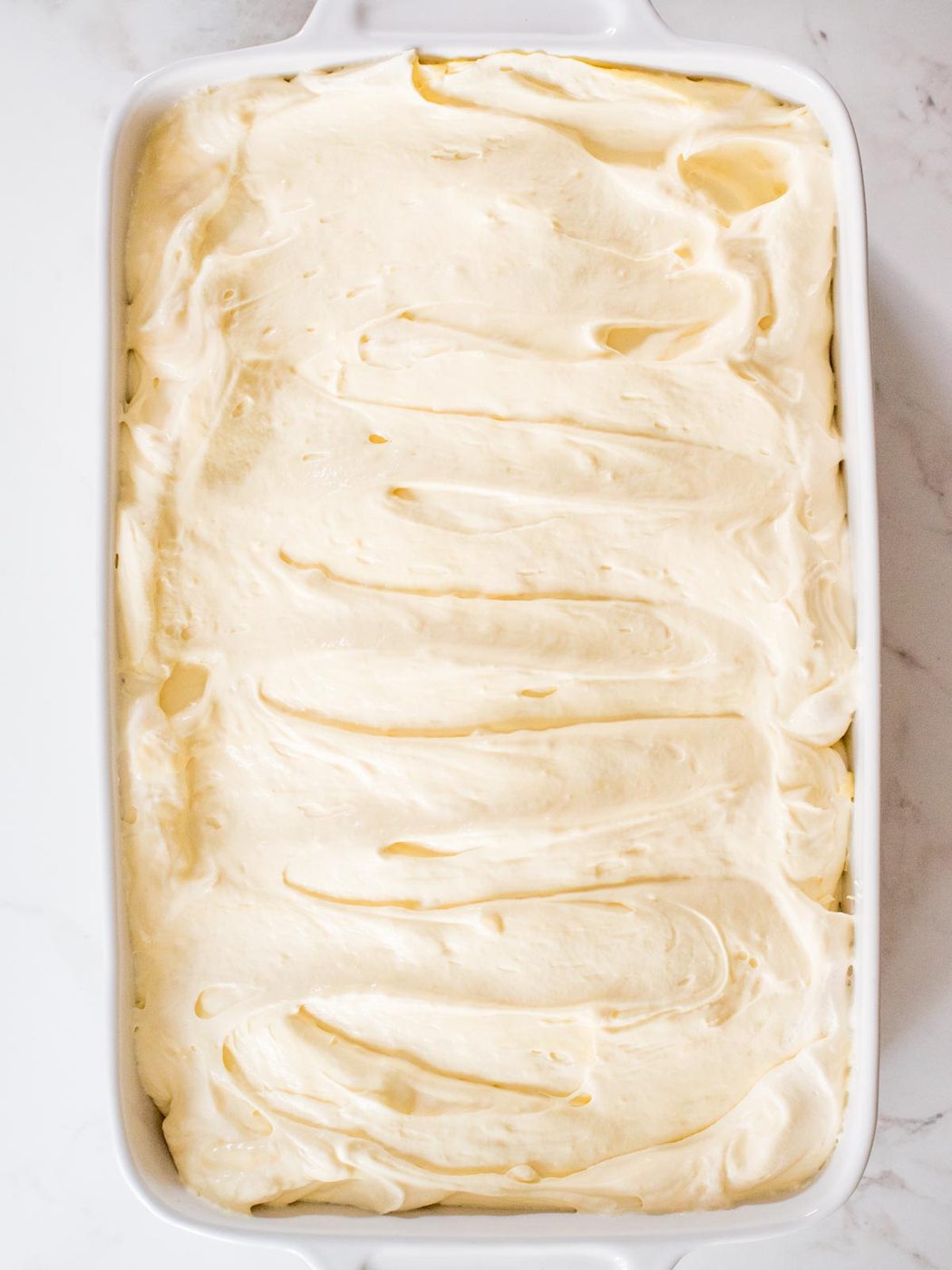 banana pudding in a casserole dish without crushed vanilla wafers on top
