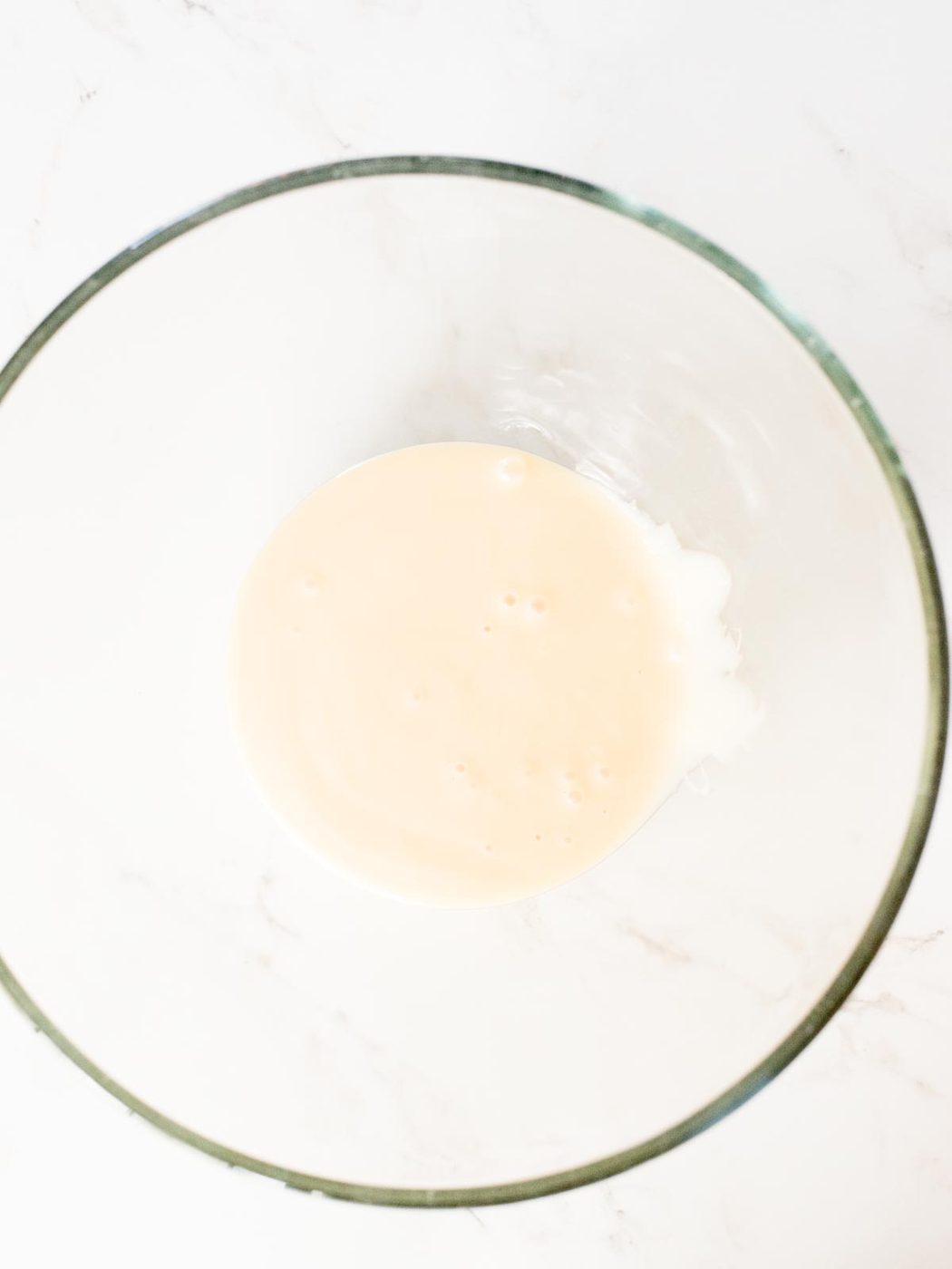 eagle brand sweetened condensed milk in a mixing bowl