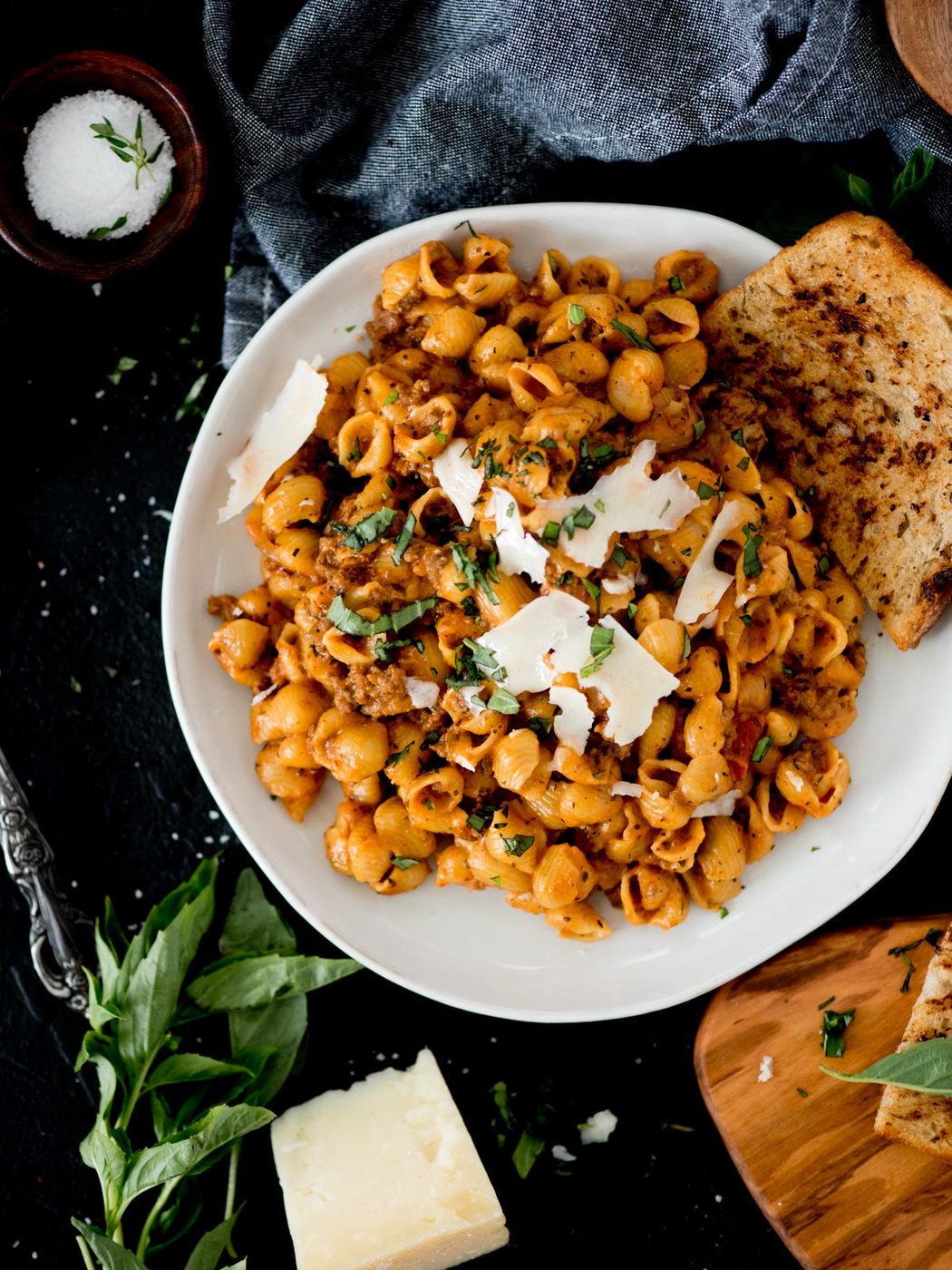 Instant Pot Ground Beef and Pasta with basil and shaved parmesan