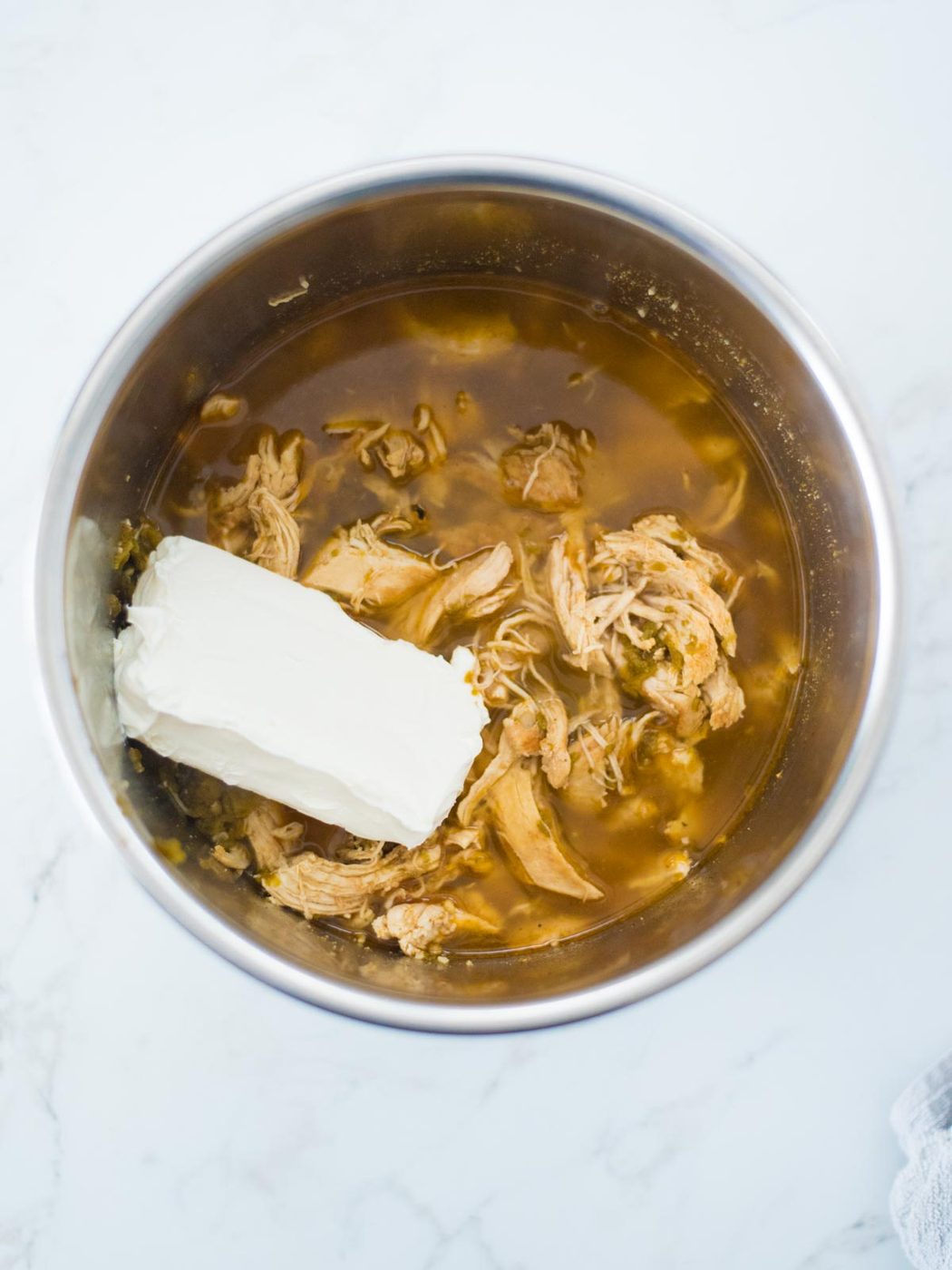 cream cheese added to chili in an instant pot