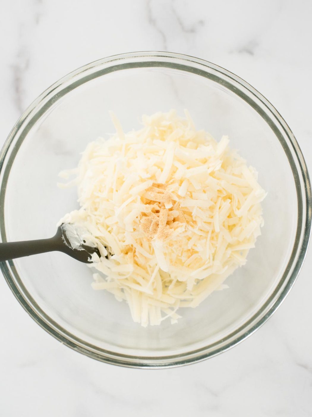 garlic powder added to bowl