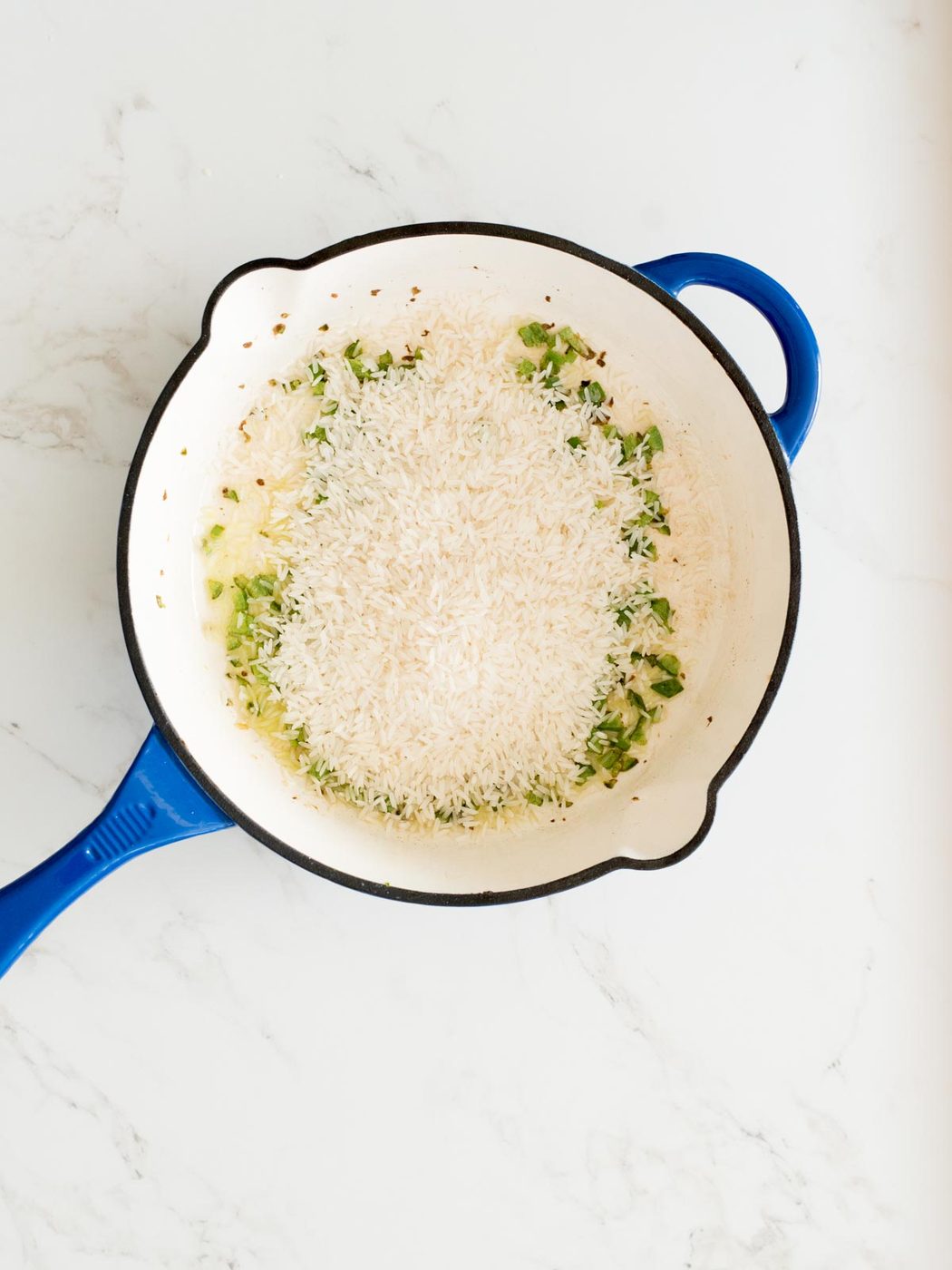 rice added to cast iron skillet