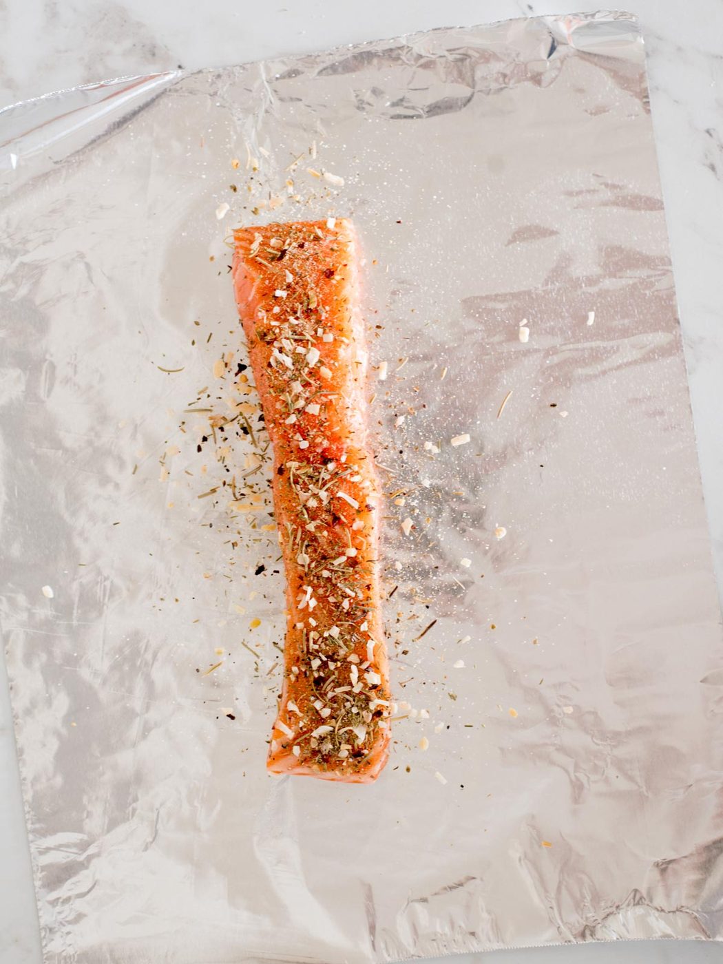 salmon filet coated in tuscan herb seasoning